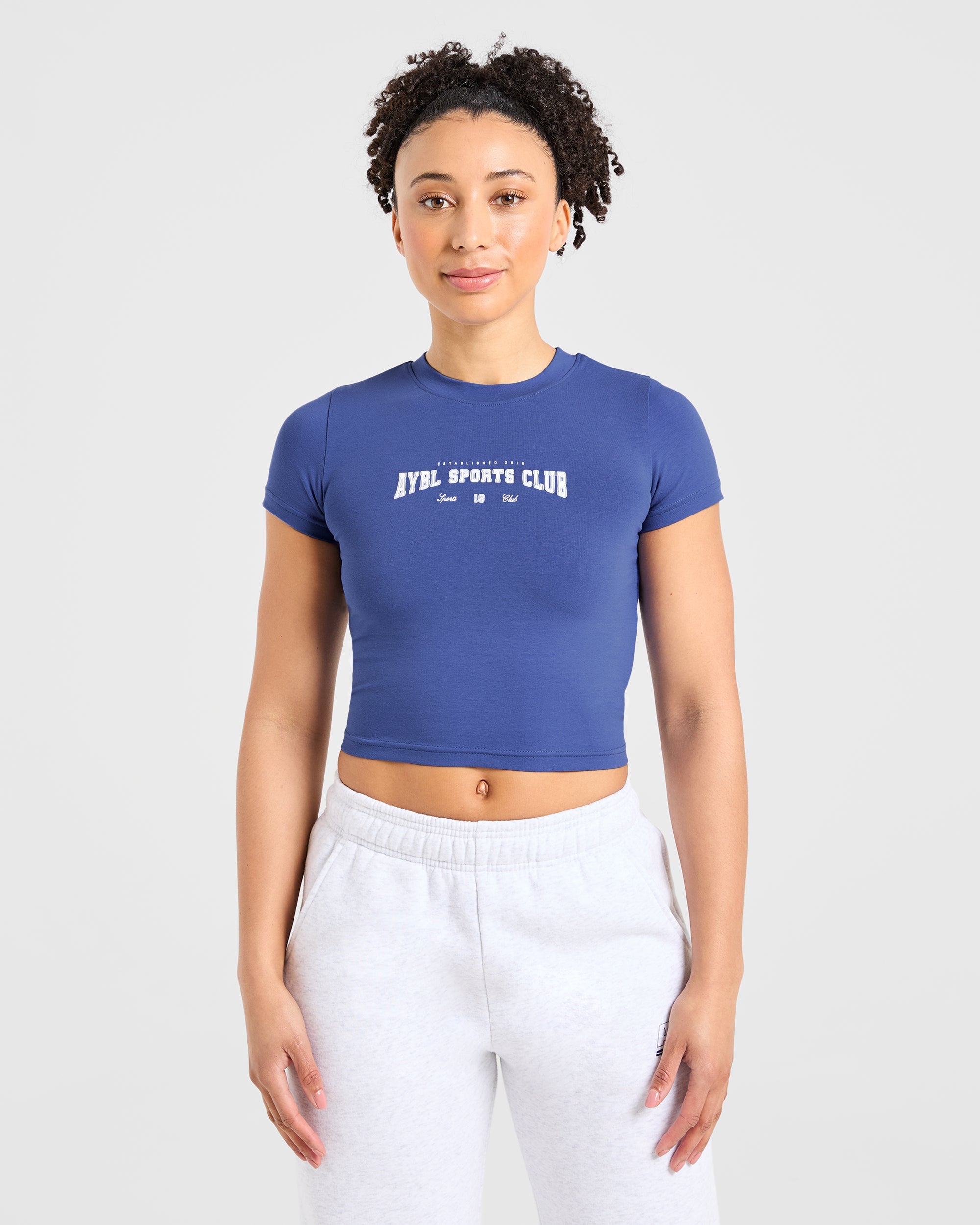 Sports Club Varsity Baby Tee – Cobalt Sports Club Varsity Baby Tee - Cobalt
