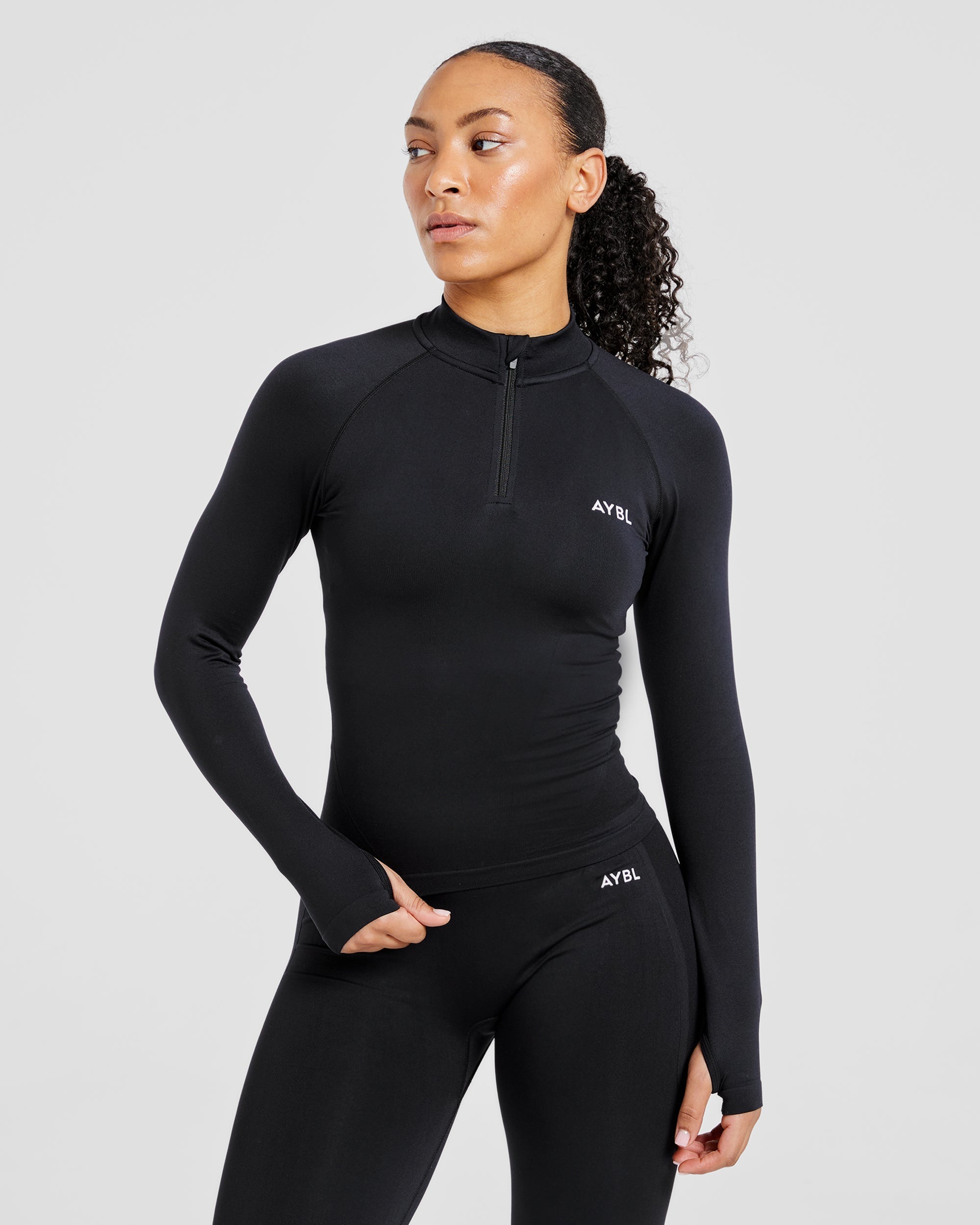 Empower Seamless 1/2 Zip Jacket – Black Empower Seamless 1/2 Zip Jacket - Black