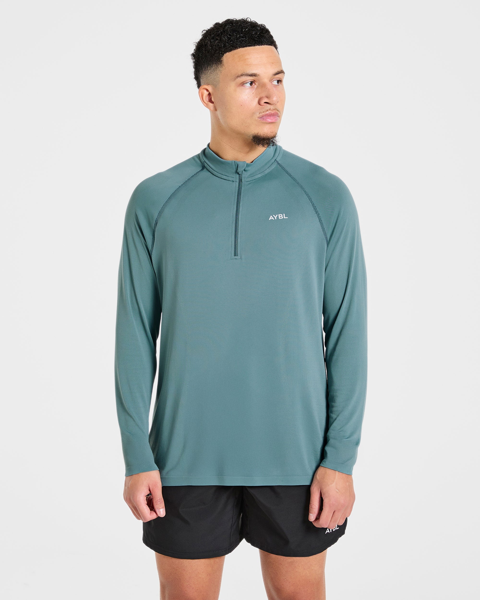 Attain Seamless 1/2 Zip Pullover – Titan Blue Attain Seamless 1/2 Zip Pullover - Titan Blue
